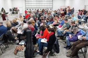 Pastor Faith welcomes attendees